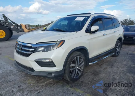 2017 Honda Pilot Elite z USA, uszkodzony, nr VIN 5FNYF6H04HB031645